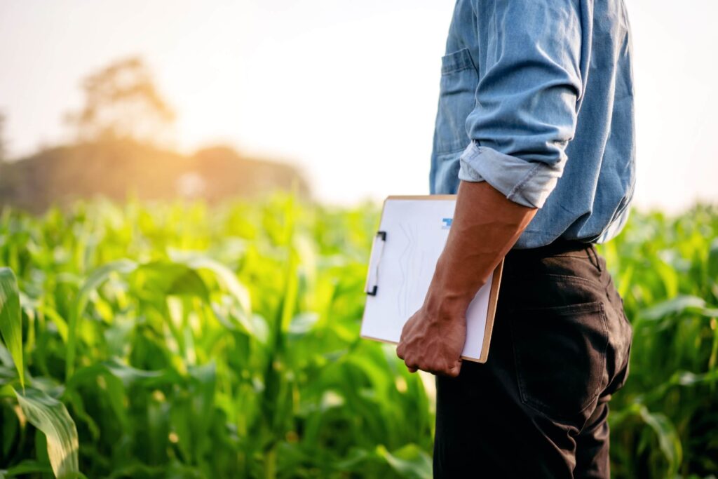 Farmer holding a clipboard