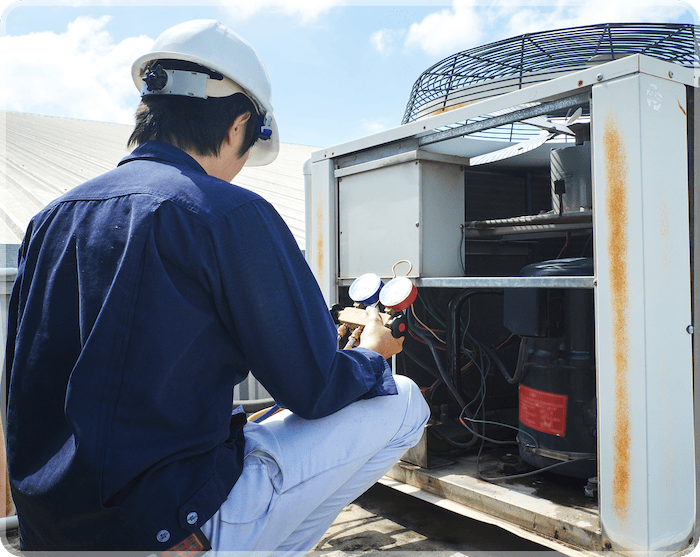 Technician checking furnace