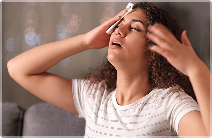 Woman catching air in humid environment